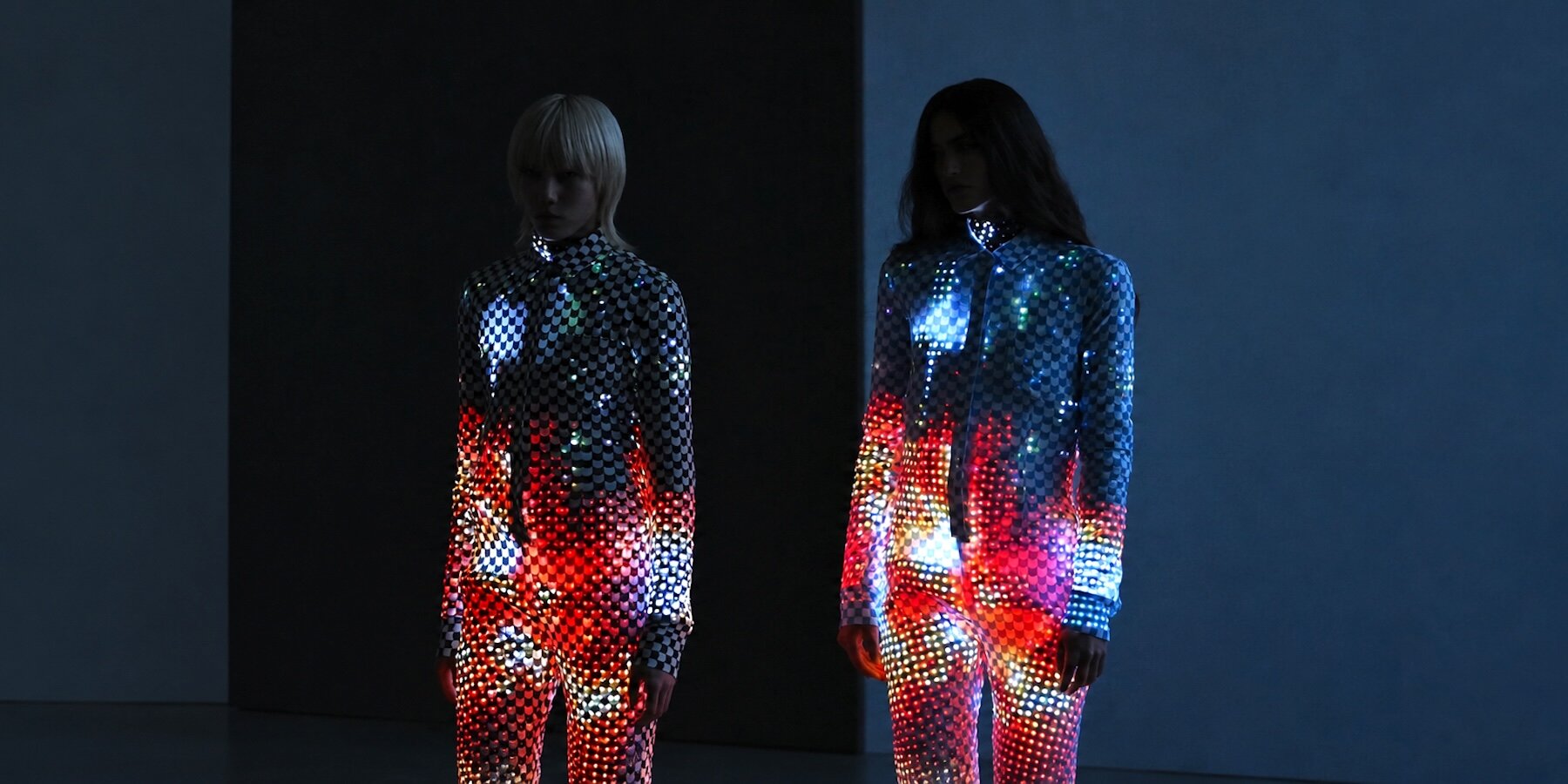ANREALAGE SS27 dress covered in colour-changing E Ink scales on the Paris runway