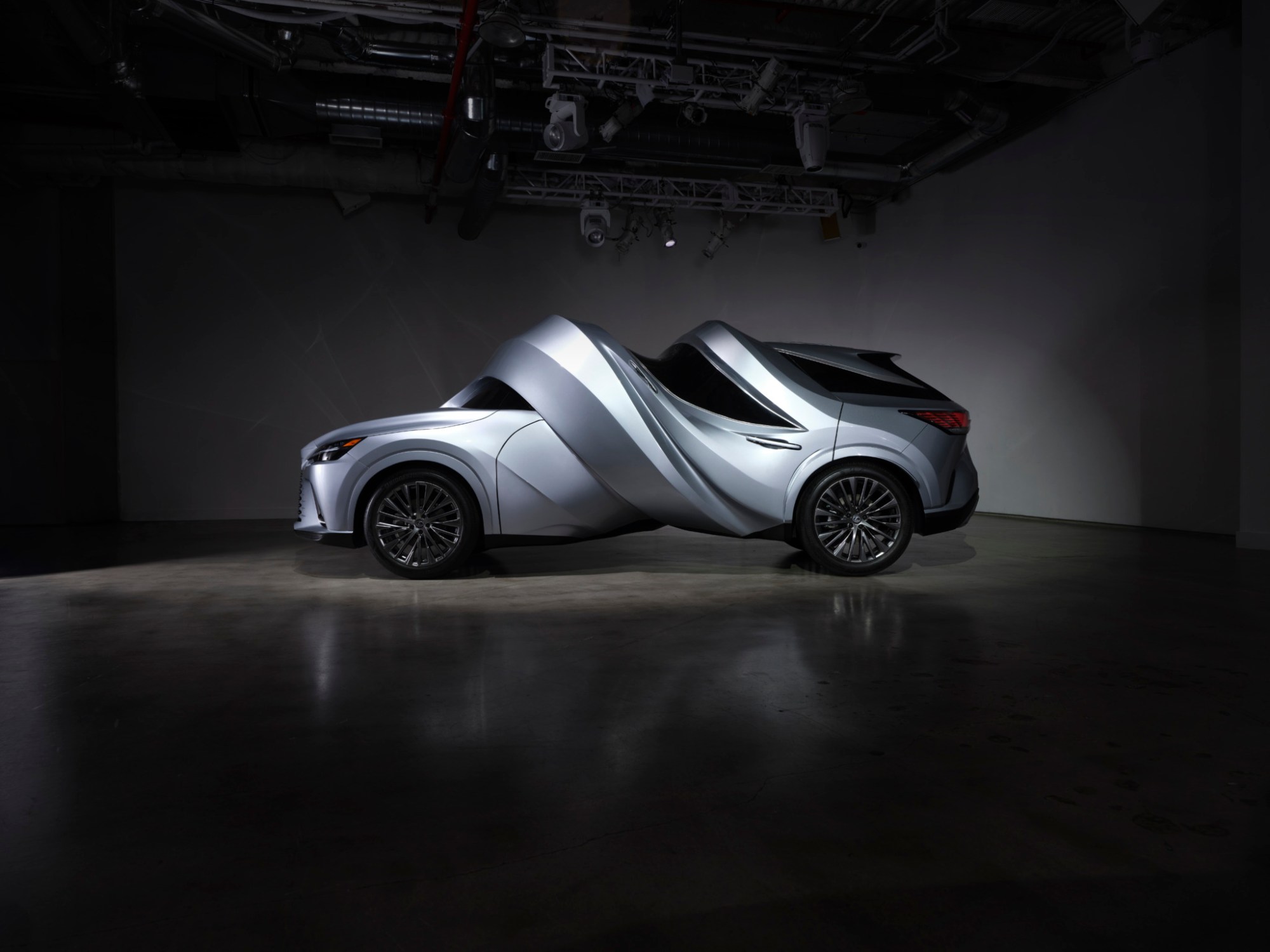 MSCHF's Twisted Car, a Lexus SUV spiralled along its length, on show at Chelsea Industrial